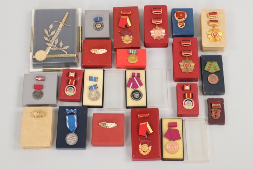 East Germany (GDR)  - lot of badges with their cases of issue