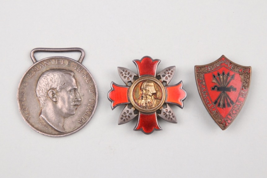 Lot of three international badges